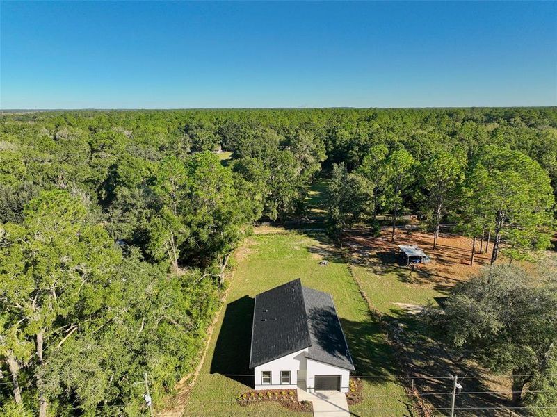 Front exterior of a new home in , Dunnellon, FL, highlighting curb appeal (Image 23).