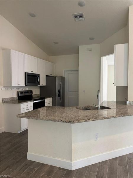Furnished interior view inside a new home in , Lehigh Acres (Image 3).