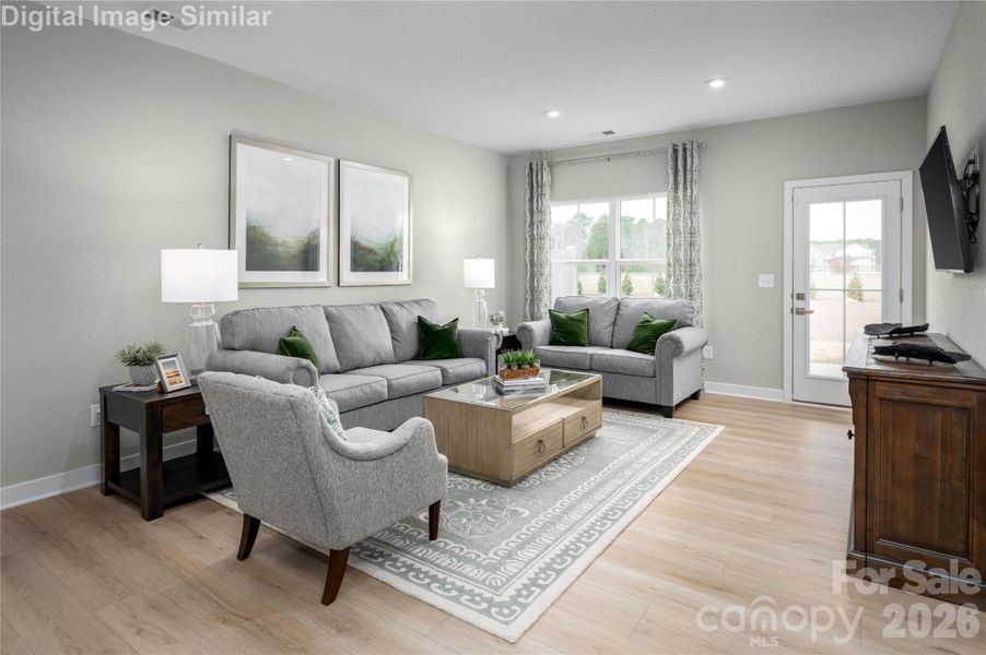 Get ready for cozy nights and effortless entertaining in this light-filled great room with open-concept flow and direct access to your own private patio. Whether it’s movie night or morning coffee, this space wraps you in comfort and connection—where every moment feels like home, and every corner invites you to stay.