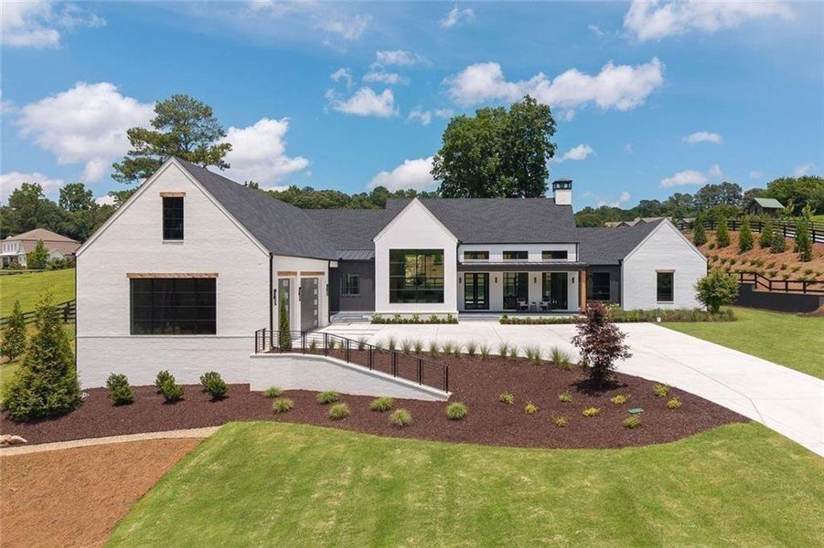 Front exterior of a new home in , Canton, GA, highlighting curb appeal (Image 27).