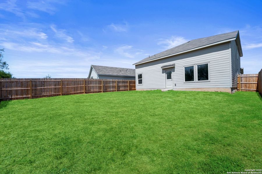 Exterior details and patio area of a home in Lodi Grove, Floresville (Image 2). Exterior details and patio area of a home in Lodi Grove, Floresville (Image 2).