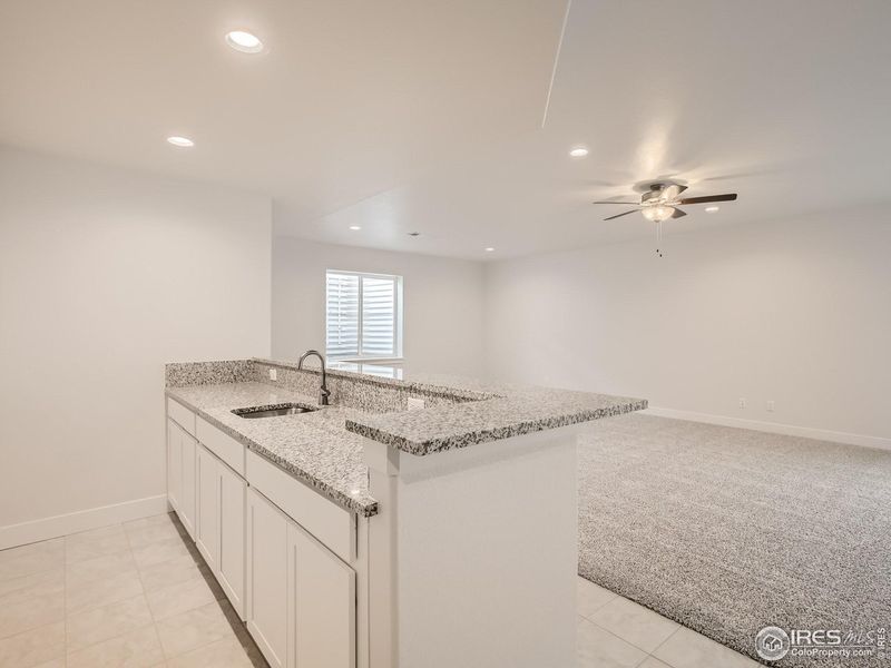 Furnished interior view inside a new home in RainDance, Windsor (Image 7).