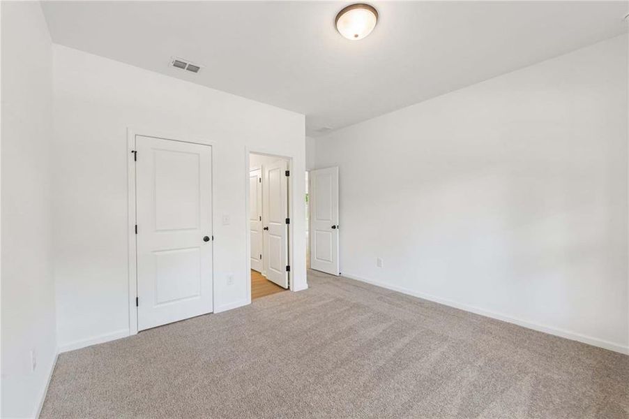 Spacious, unfurnished interior of a new home in Eastlyn Crossing, Flowery Branch (Image 11). Spacious, unfurnished interior of a new home in Eastlyn Crossing, Flowery Branch (Image 11).