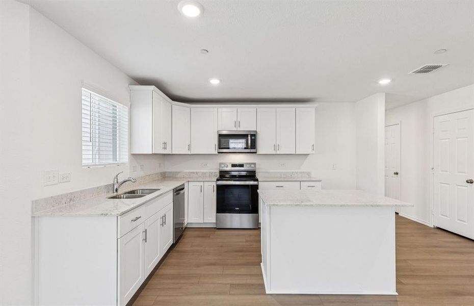 Spacious kitchen with ample cabinet space