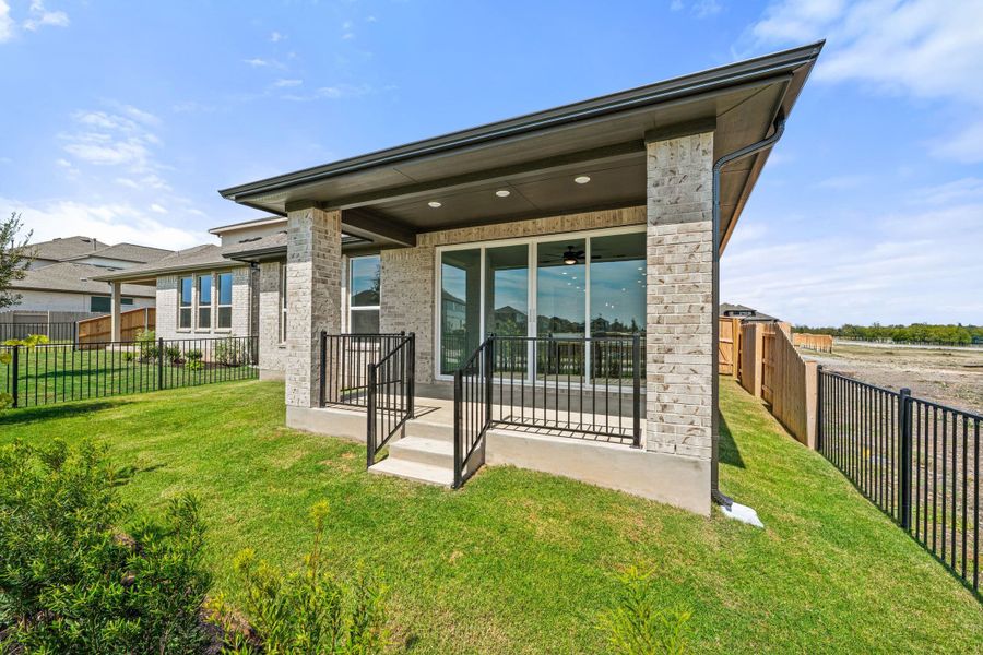 Exterior details and patio area of a home in Flora, Hutto (Image 26).