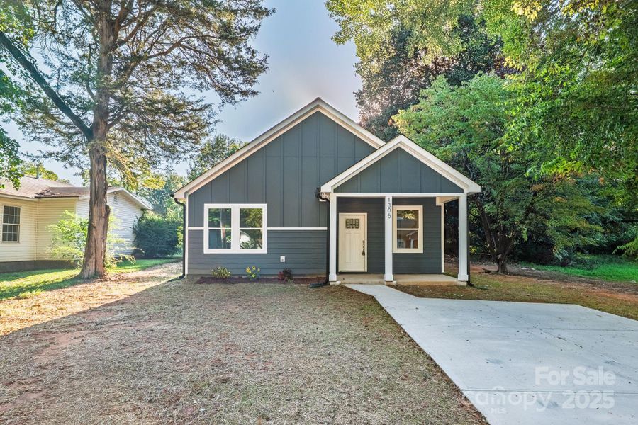 Front exterior of a new home in , Statesville, NC, highlighting curb appeal (Image 26). Front exterior of a new home in , Statesville, NC, highlighting curb appeal (Image 26).