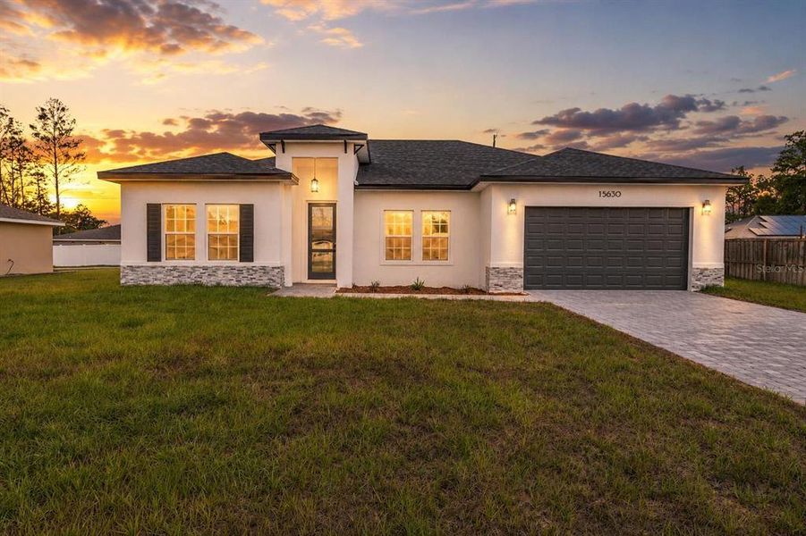 Front exterior of a new home in , Ocala, FL, highlighting curb appeal (Image 2). Front exterior of a new home in , Ocala, FL, highlighting curb appeal (Image 2).