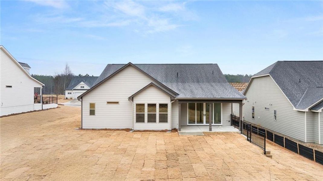 Exterior details and patio area of a home in Soleil Belmont Park, Canton (Image 33).