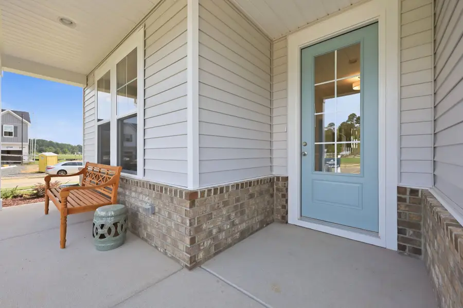 Representative exterior details of a home built from the The Daphne C by Davidson Homes LLC in Wendell Ridge, Wendell (Image 3). Representative exterior details of a home built from the The Daphne C by Davidson Homes LLC in Wendell Ridge, Wendell (Image 3).