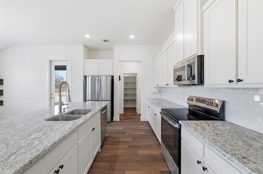 Furnished interior view inside a new home in , Boyd (Image 10).