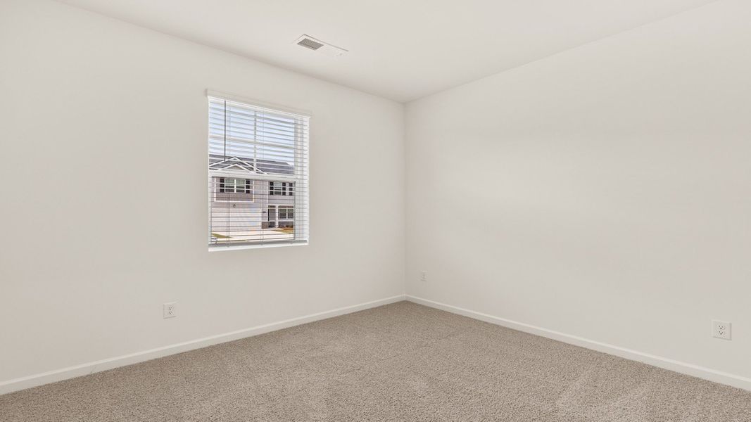 Representative unfurnished interior of a home built from the Macon by D.R. Horton in Poplar Preserve, Newnan (Image 15).