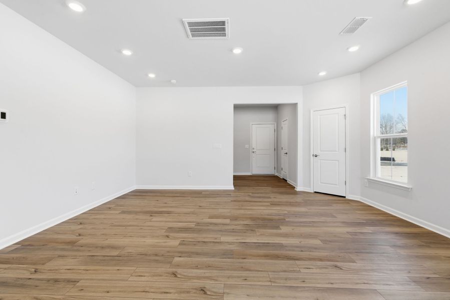 Spacious, unfurnished interior of a new home in Poets Walk, Whitsett (Image 42).