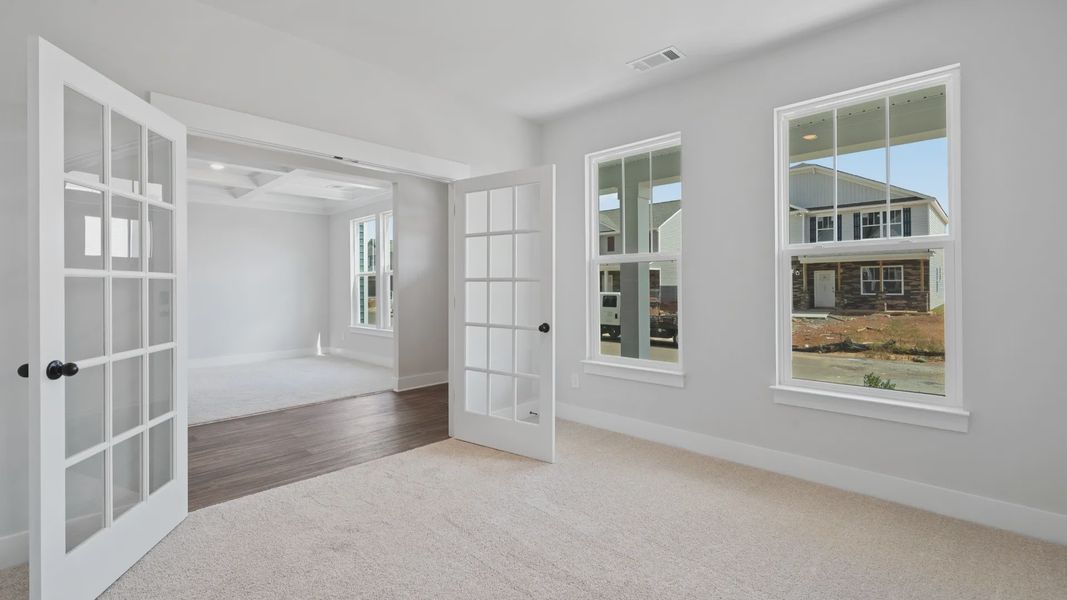 Representative furnished interior of a home built from the Stonefield - Finished Basement by DRB Homes in Pinebrook, Woodruff (Image 15).