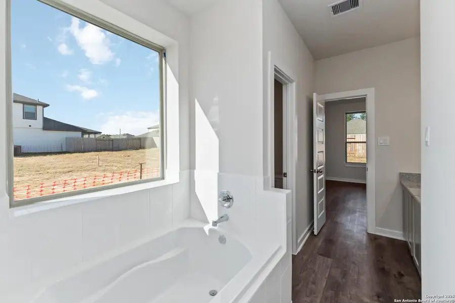 Furnished interior view inside a new home in Timber Creek, San Antonio (Image 11).
