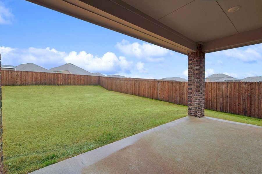 View of yard with a patio