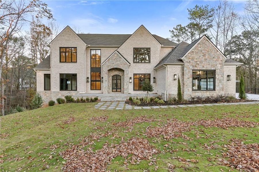 Front exterior of a new home in , Johns Creek, GA, highlighting curb appeal (Image 18).