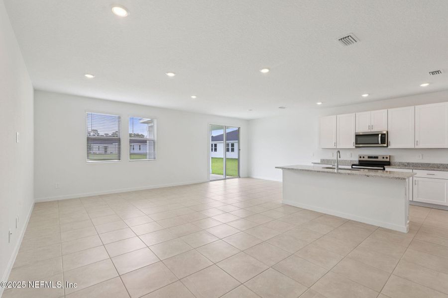 Spacious, unfurnished interior of a new home in Flagler Village - Signature Series, Palm Coast (Image 37).