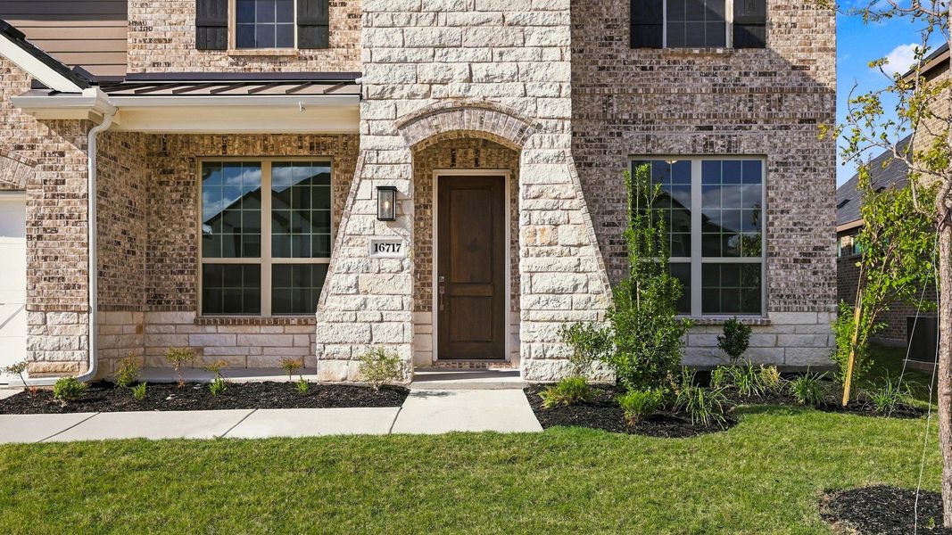 Exterior details and patio area of a home in Green Meadows Classic, Celina (Image 27).