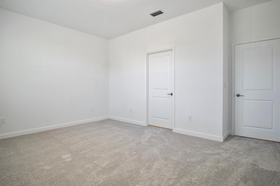 Primary bedroom to bathroom.jpg-FULL