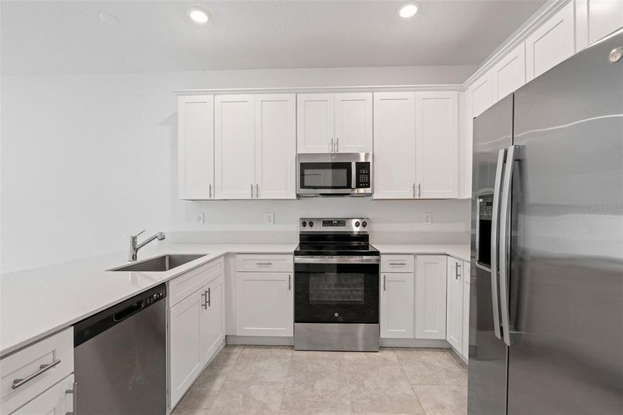 Furnished interior view inside a new home in Lake Wilson Reserve, Kissimmee (Image 6). Furnished interior view inside a new home in Lake Wilson Reserve, Kissimmee (Image 6).