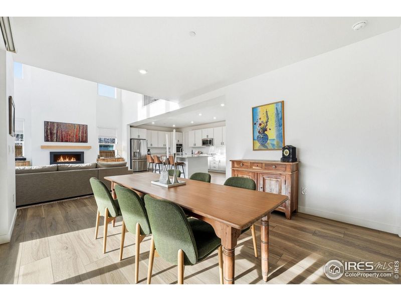 A glimpse of how this home flows, with open dining and gathering spaces made to connect.