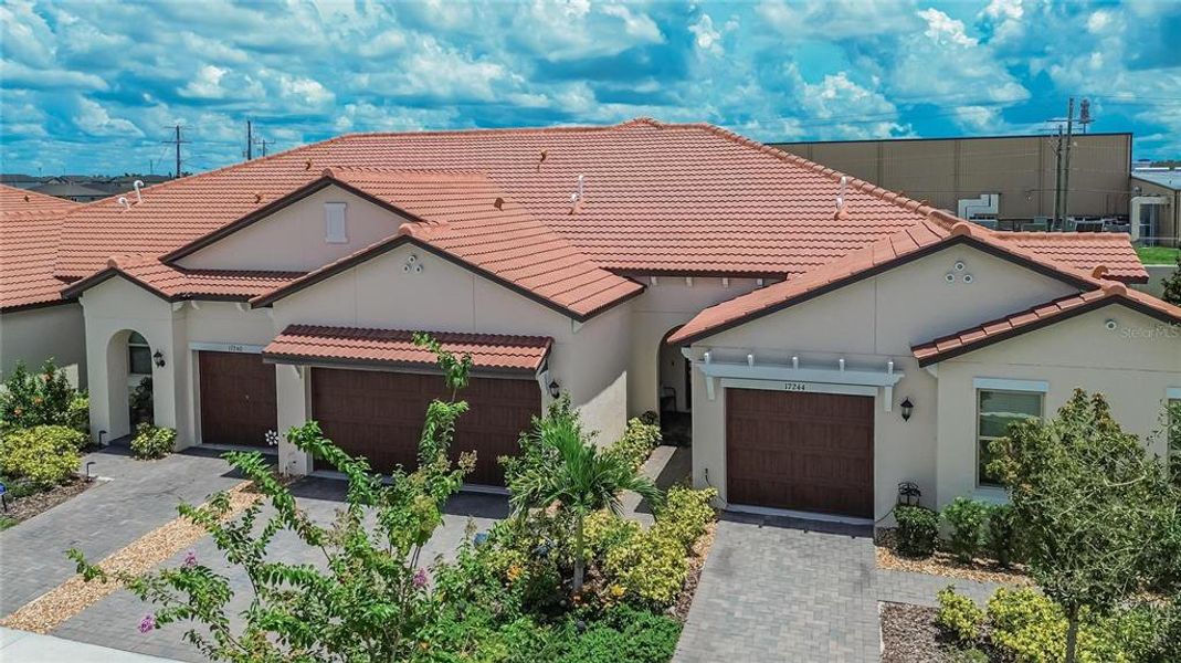Front exterior of a new home in Southshore Bay Active Adult, Wimauma, FL, highlighting curb appeal (Image 28).