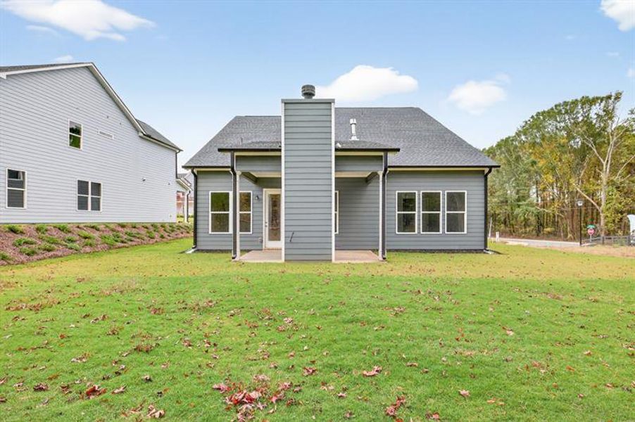 Exterior details and patio area of a home in Red Bird Manor, Jefferson (Image 3).