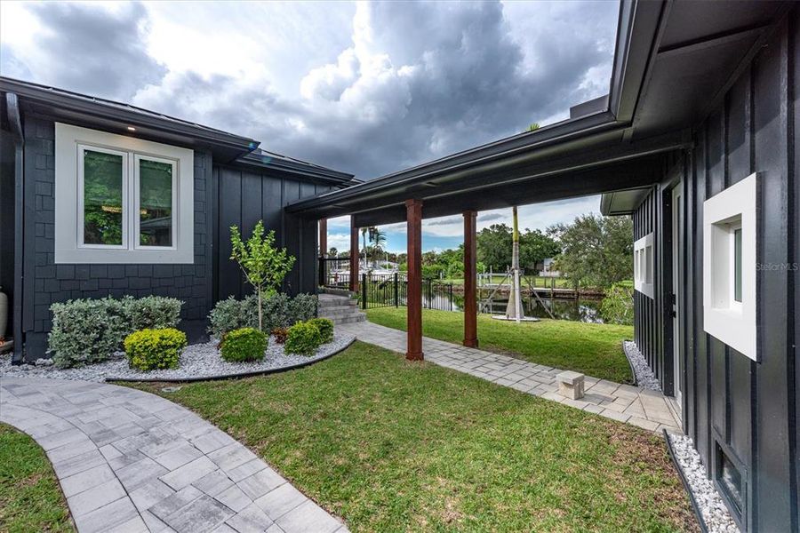Front exterior of a new home in , Punta Gorda, FL, highlighting curb appeal (Image 33).