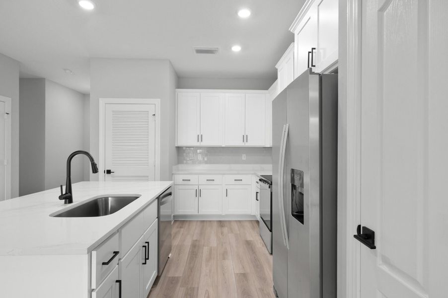 Furnished interior view inside a new home in Celebration Pointe, Fort Pierce (Image 4).