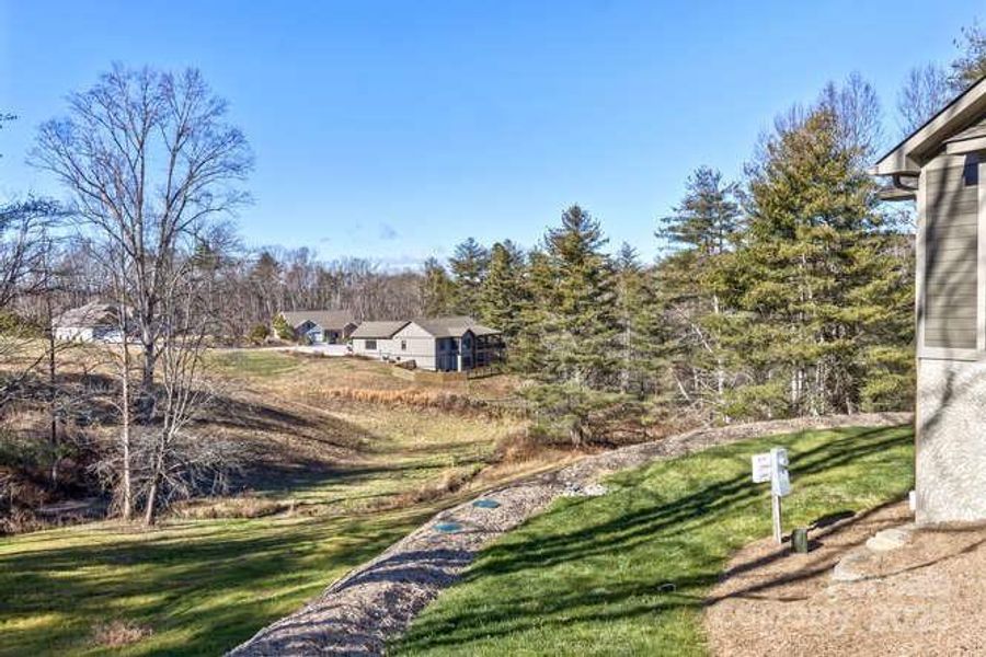 Exterior details and patio area of a home in , Fletcher (Image 21).