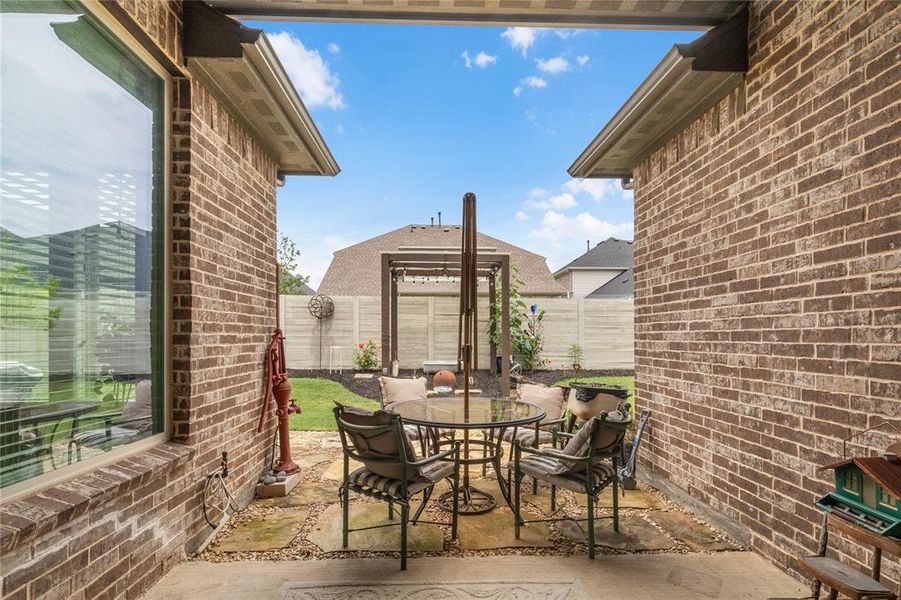 Exterior details and patio area of a home in Harvest, Northlake (Image 2). Exterior details and patio area of a home in Harvest, Northlake (Image 2).