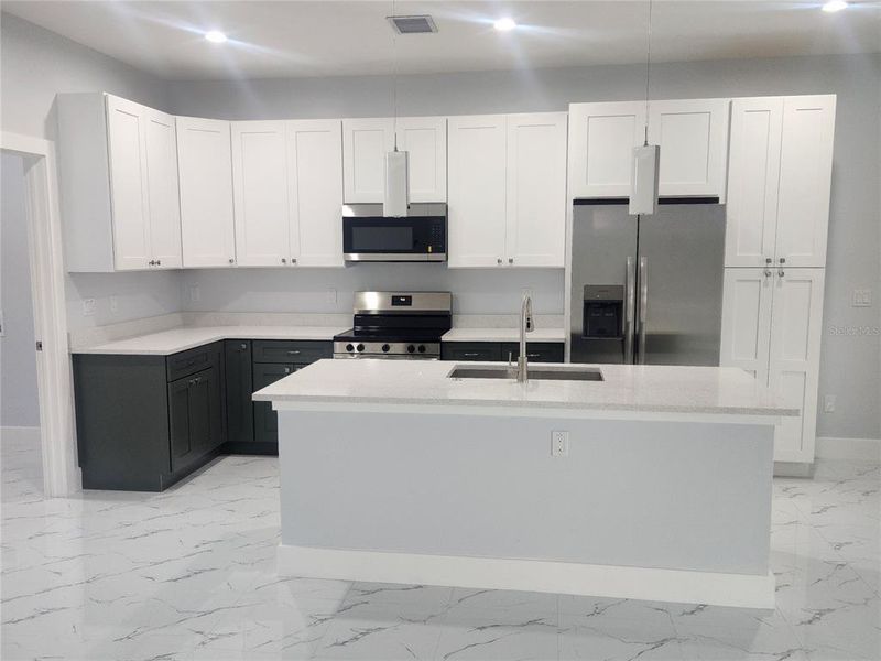 Furnished interior view inside a new home in , Port Charlotte (Image 9).