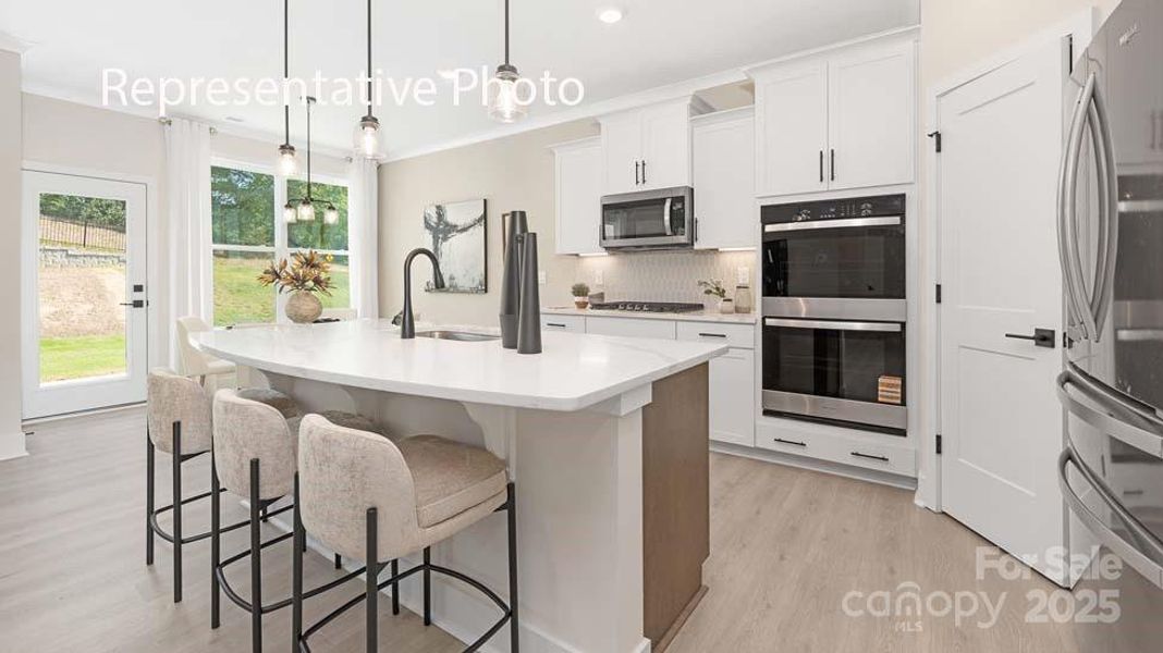 Furnished interior view inside a new home in Sanctuary at Southgate, Indian Trail (Image 3).