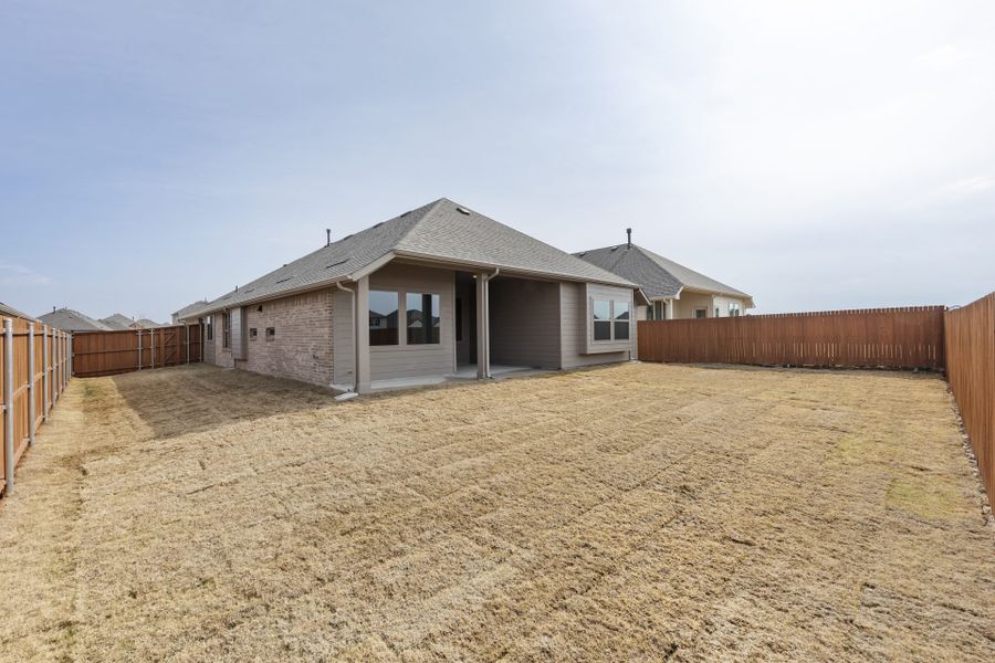 Exterior details and patio area of a home in Heartland, Heartland (Image 18).