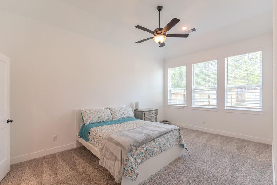 Furnished interior view inside a new home in The Woodlands Hills, Willis (Image 24).