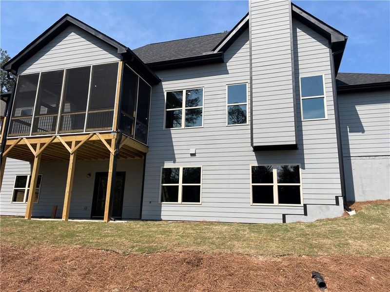 Front exterior of a new home in , Marietta, GA, highlighting curb appeal (Image 1).
