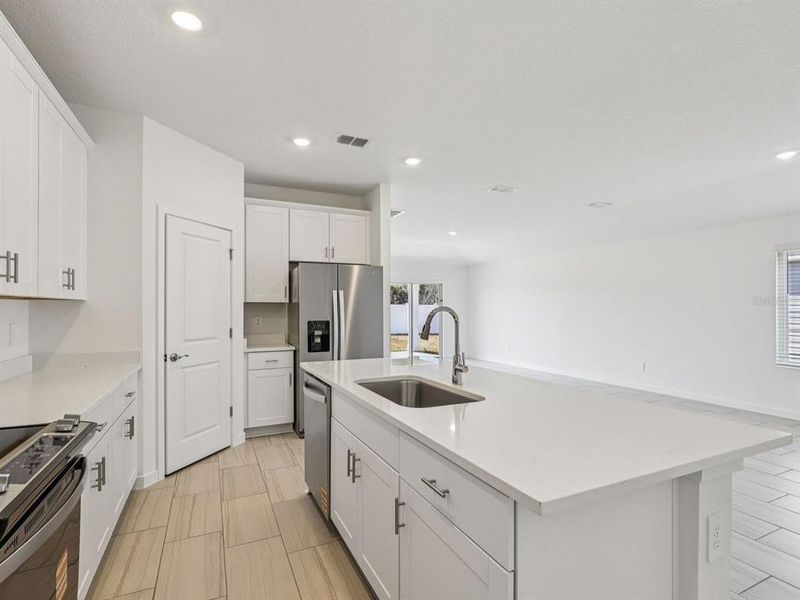 Furnished interior view inside a new home in Colbert Landings, Palm Coast (Image 4).