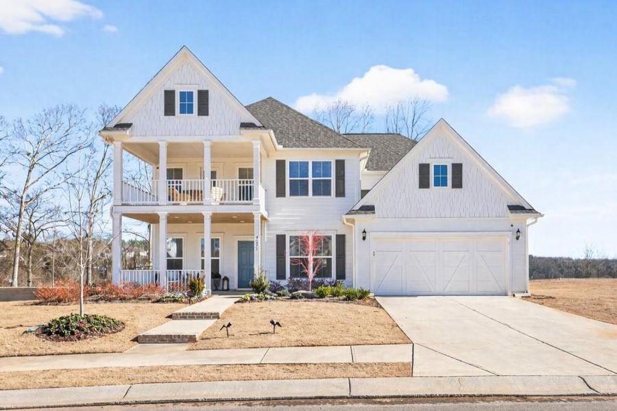 Front exterior of a new home in Reunion, Flowery Branch, GA, highlighting curb appeal (Image 29).