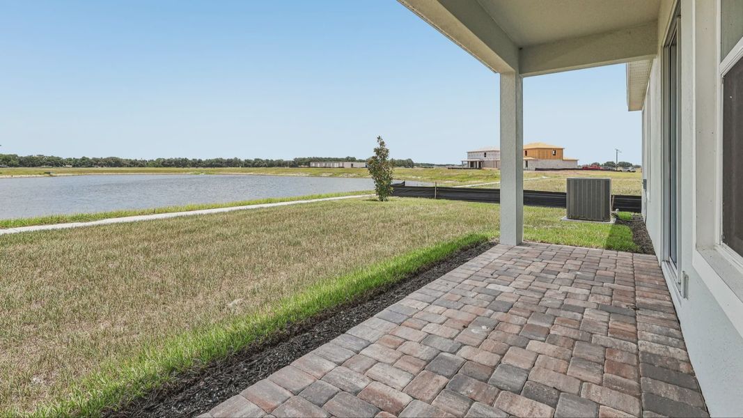 Lakeside views from covered Paver rear porch