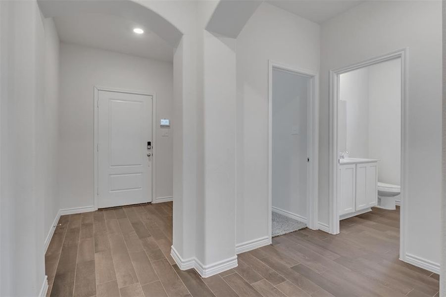 Entryway with wood-type flooring