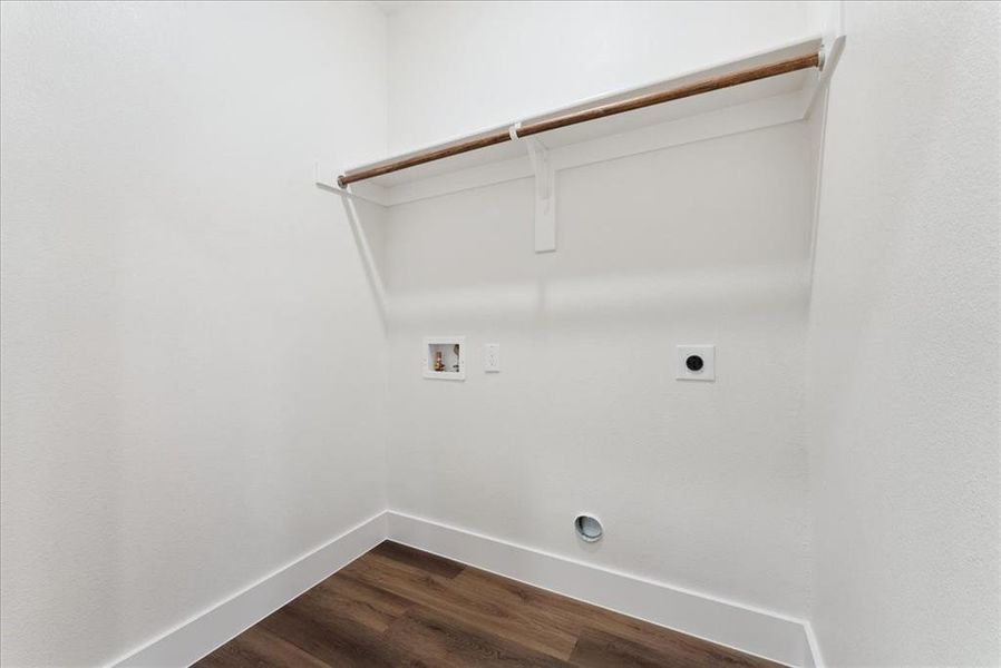 Washroom with hookup for an electric dryer, washer hookup