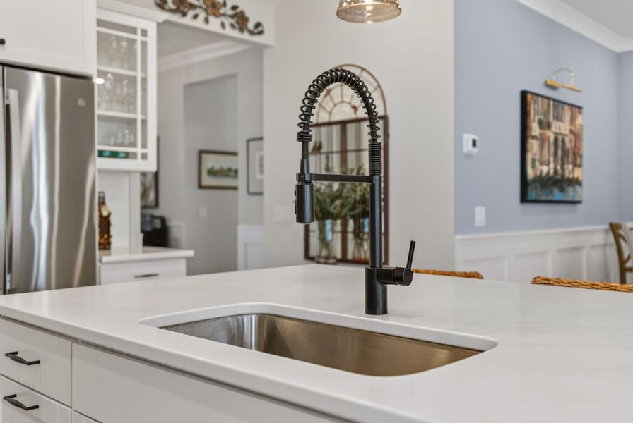 Close-up of interior finishes inside a home in K. Hovnanian's® Four Seasons at Lakes of Cane Bay, Summerville (Image 21).