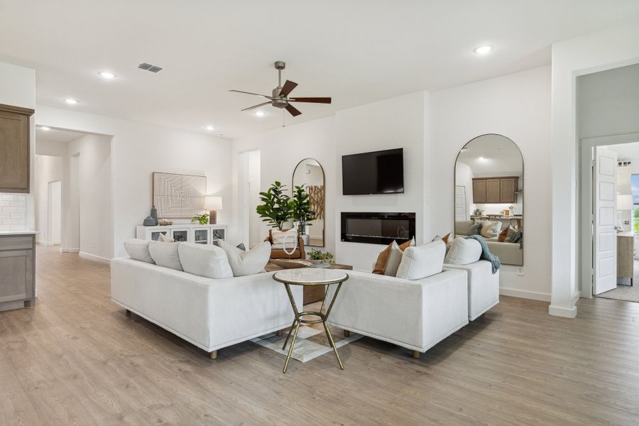 Living room in the Gilmour home plan by Trophy Signature Homes – REPRESENTATIVE PHOTO