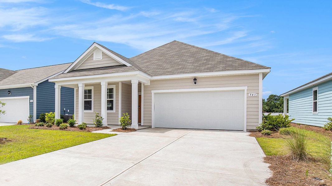 Front exterior of a new home in Auberon Woods, Conway, SC, highlighting curb appeal (Image 15).