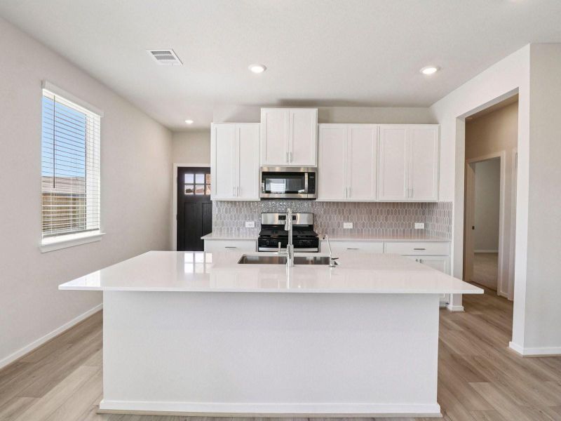 Photo is not of the actual home, but is an inspirational photo of builder’s model home and may depict options, furnishings, and/or decorator features that are not included