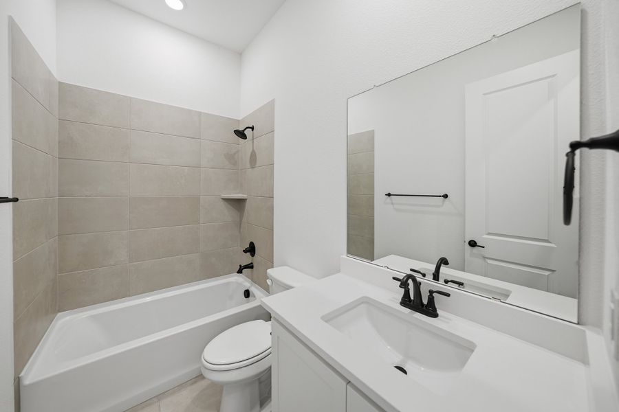 Furnished interior view inside a new home in Light Farms Brenham - 40' Lots, Celina (Image 6).