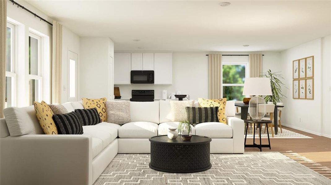 Living area with wood finished floors and baseboards Living area with wood finished floors and baseboards