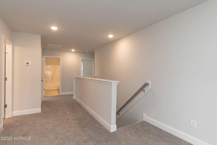Representative unfurnished interior of a home built from the 3105 by Adams Homes in Parkland Place, Pace (Image 28).
