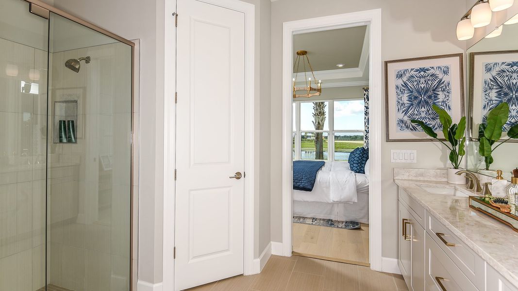 Furnished interior view inside a new home in Esplanade by the Islands, Naples (Image 10).
