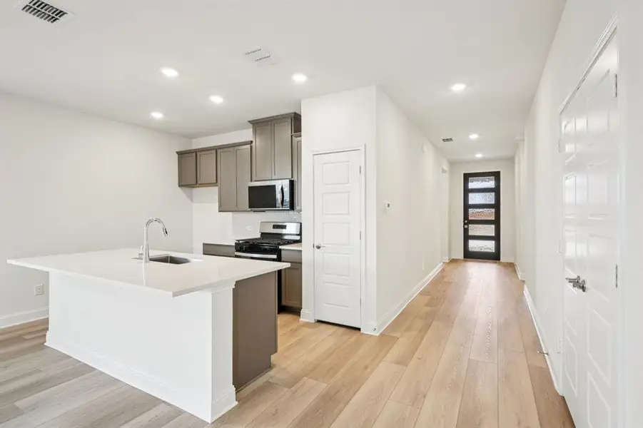 Furnished interior view inside a new home in Eagle Creek, Denton (Image 6).